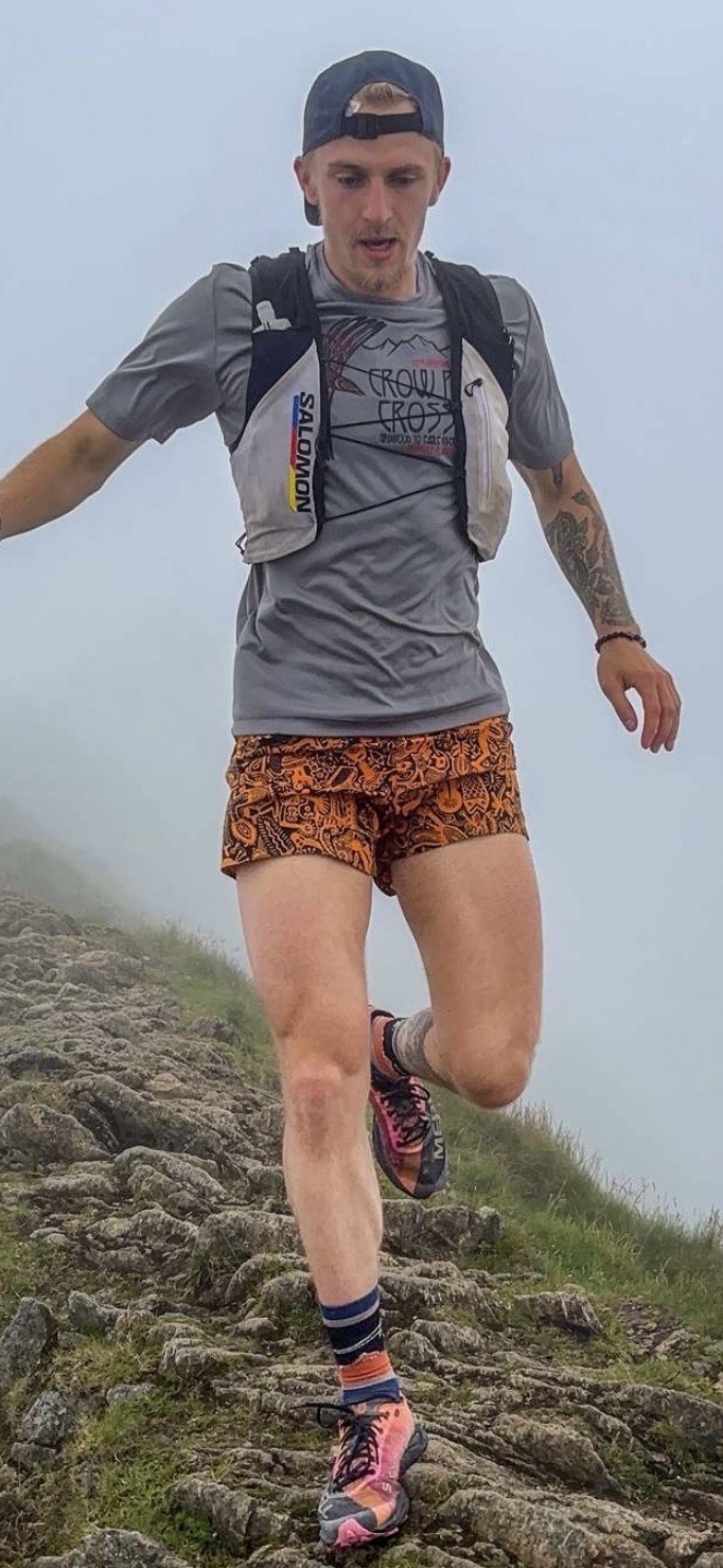 Josh Taylor running down a mountain.